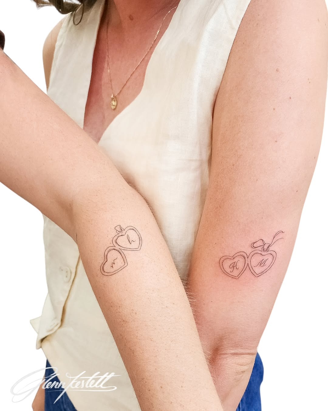 Sweet heart tattoos with initials for sisters Tattoo Design