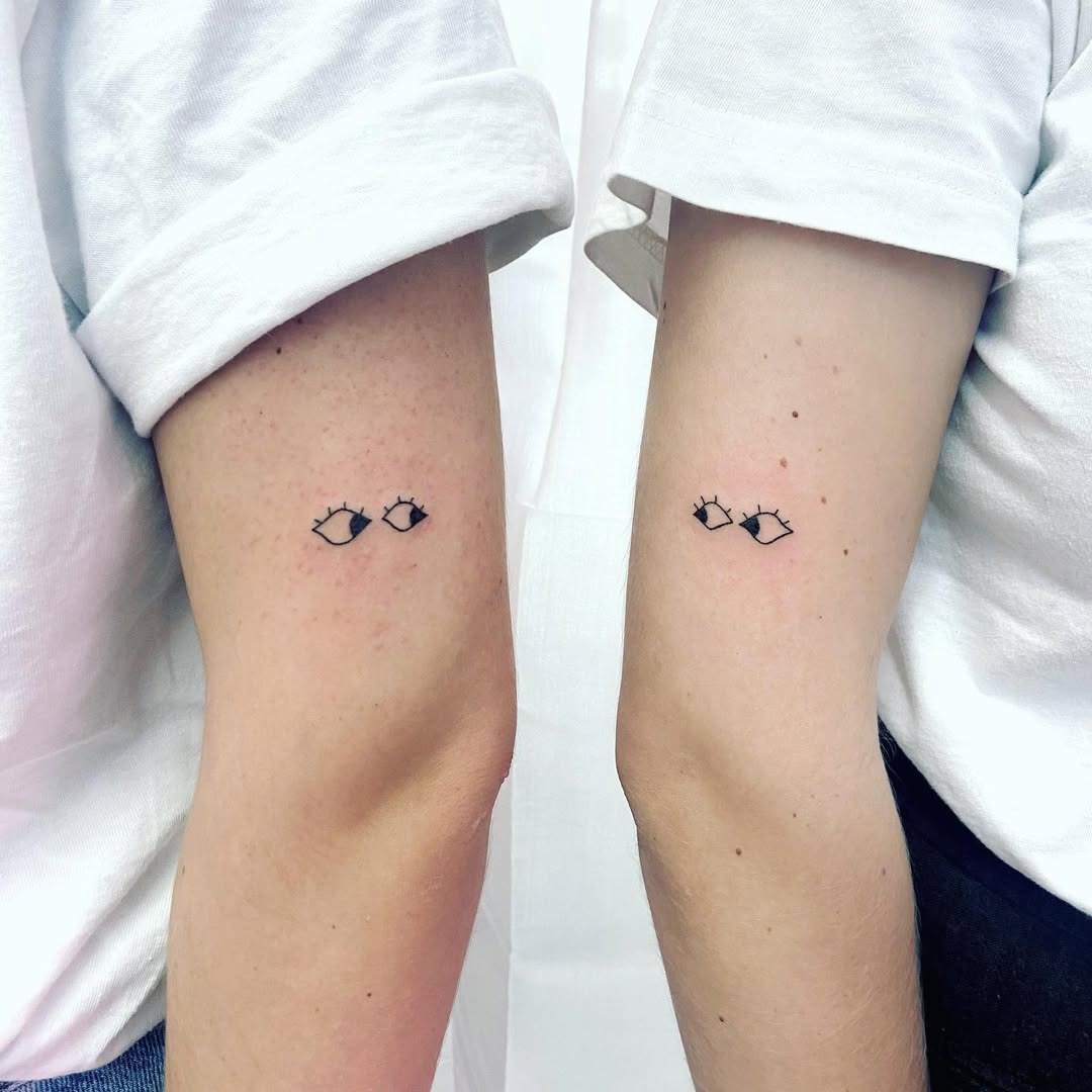 Unique sister tattoos showcasing special bond Tattoo Design