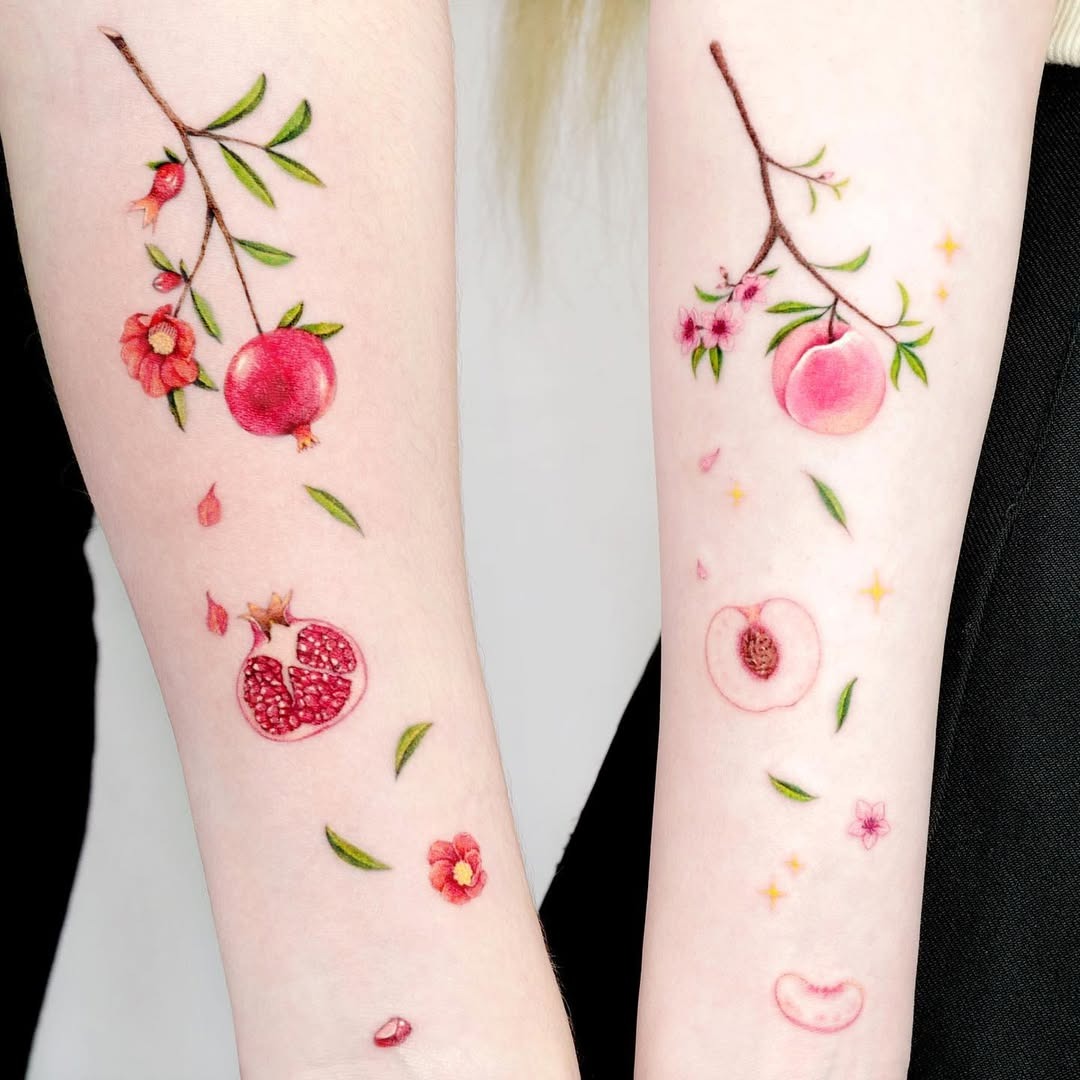 Vibrant fruit-themed sister tattoos for bonding Tattoo Design