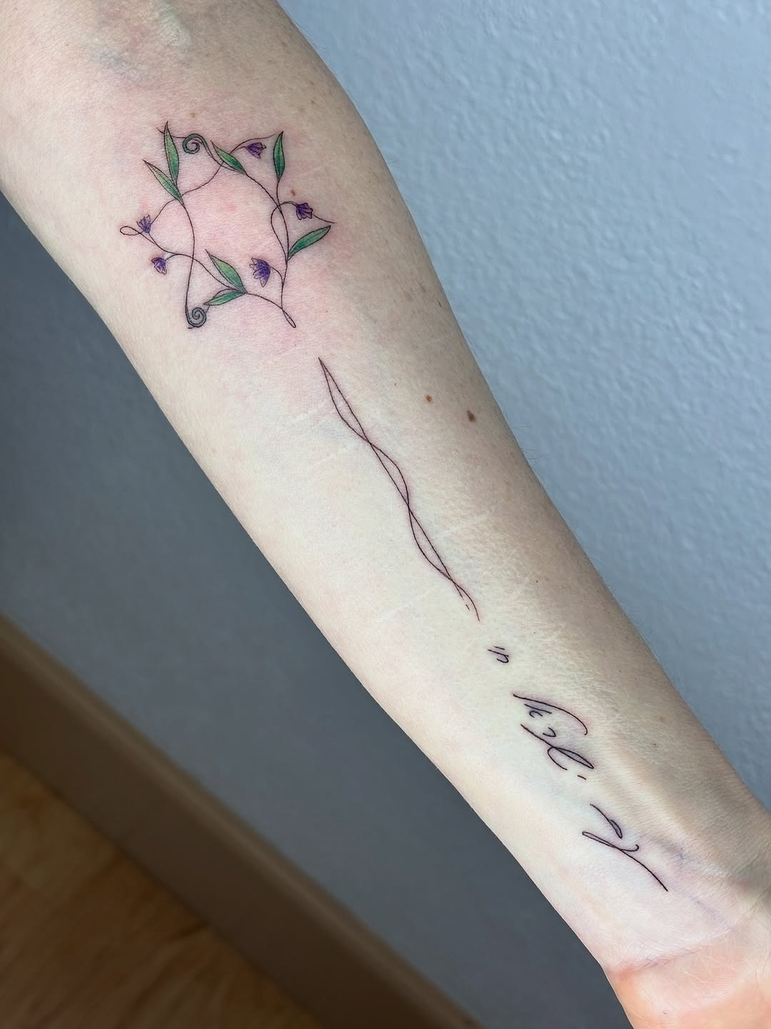 Delicate floral Hebrew tattoo design Tattoo Design