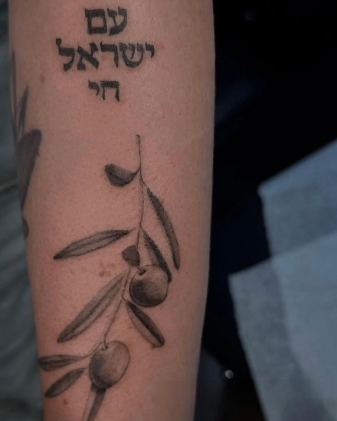 Elegant Hebrew Script with Olive Branch Design Tattoo Design