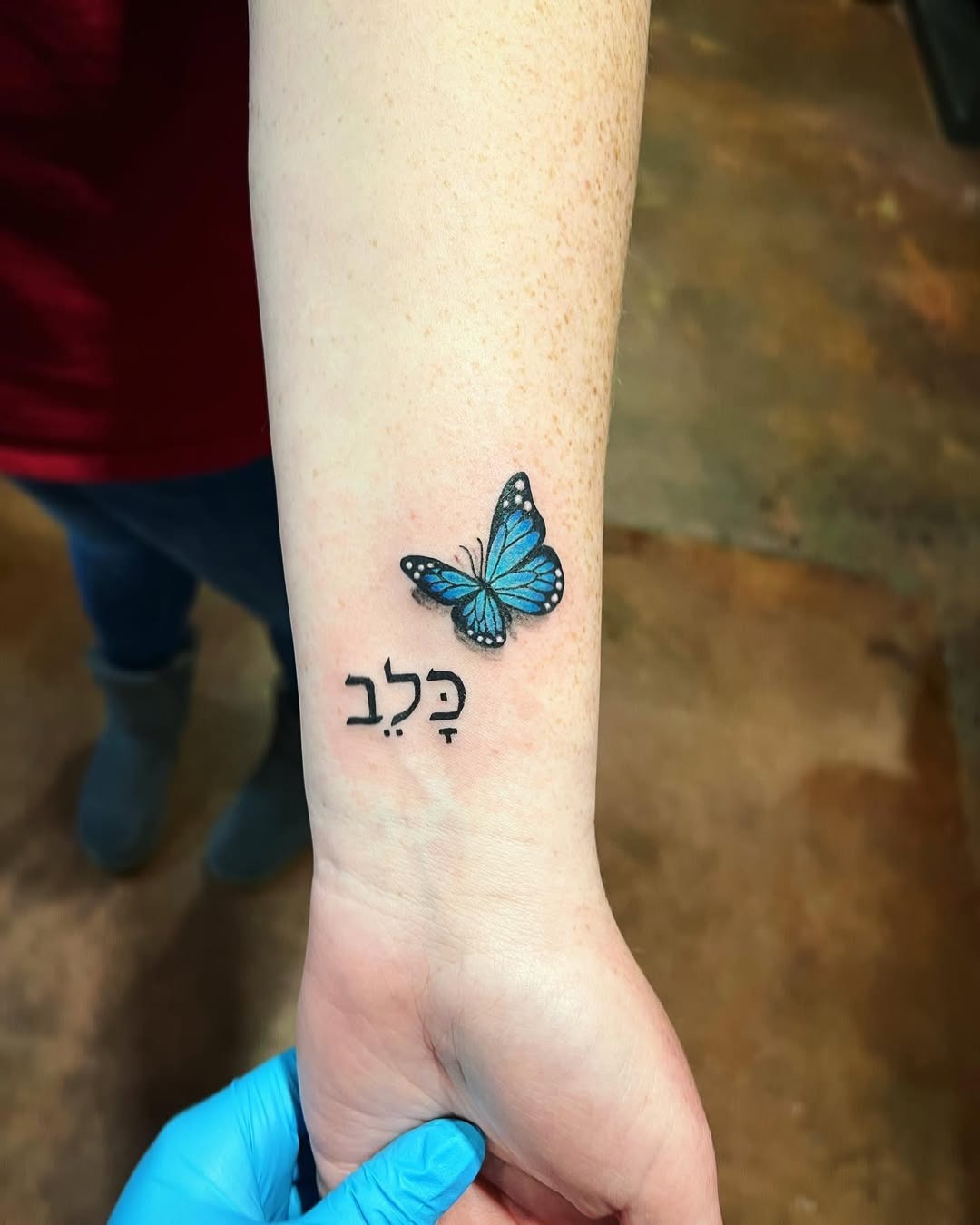 Elegant Hebrew Tattoo with Butterfly Design Tattoo Design