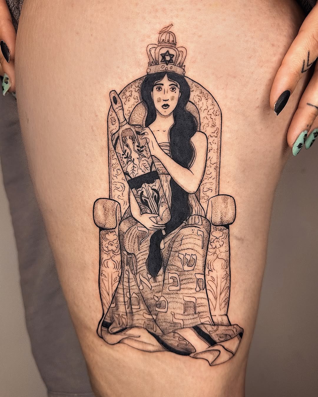 Intricate Hebrew tattoo of a regal figure Tattoo Design