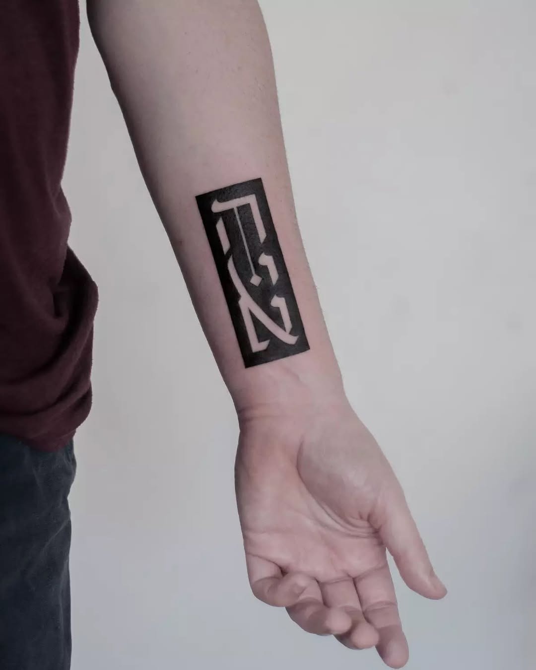 Striking Hebrew Tattoo in Bold Black Design Tattoo Design