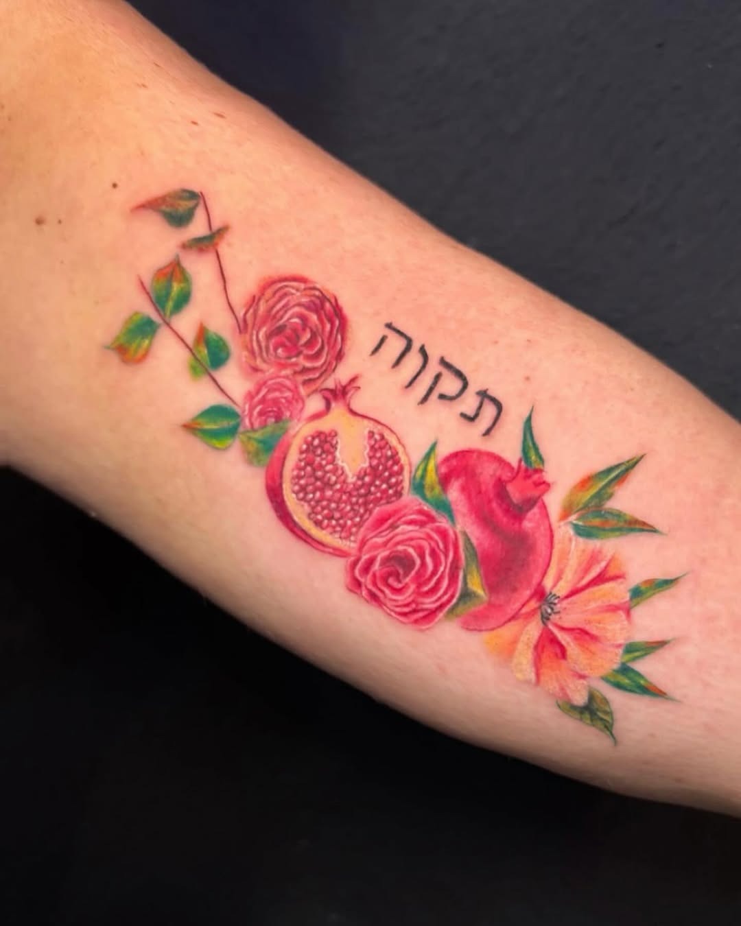 Vibrant Hebrew Tattoo Featuring Pomegranate Tattoo Design
