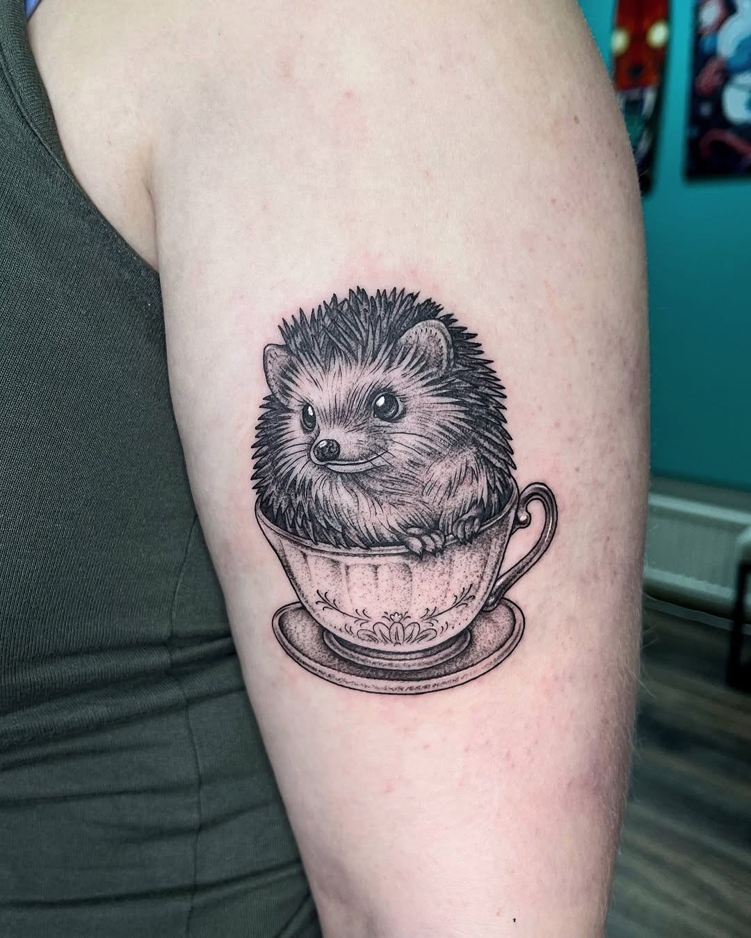 Charming hedgehog in a delicate teacup design Tattoo Design