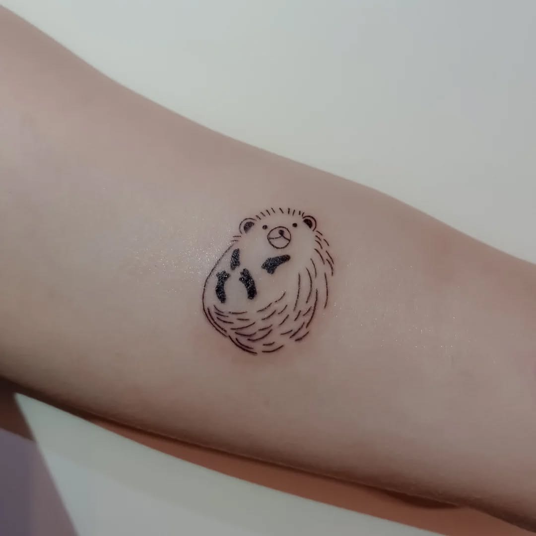 Charming hedgehog tattoo exuding playful vibes Tattoo Design