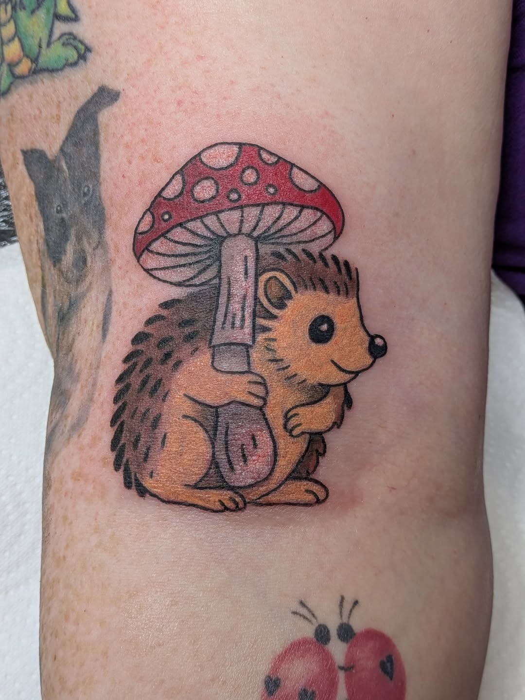 Charming hedgehog with a whimsical mushroom hat Tattoo Design