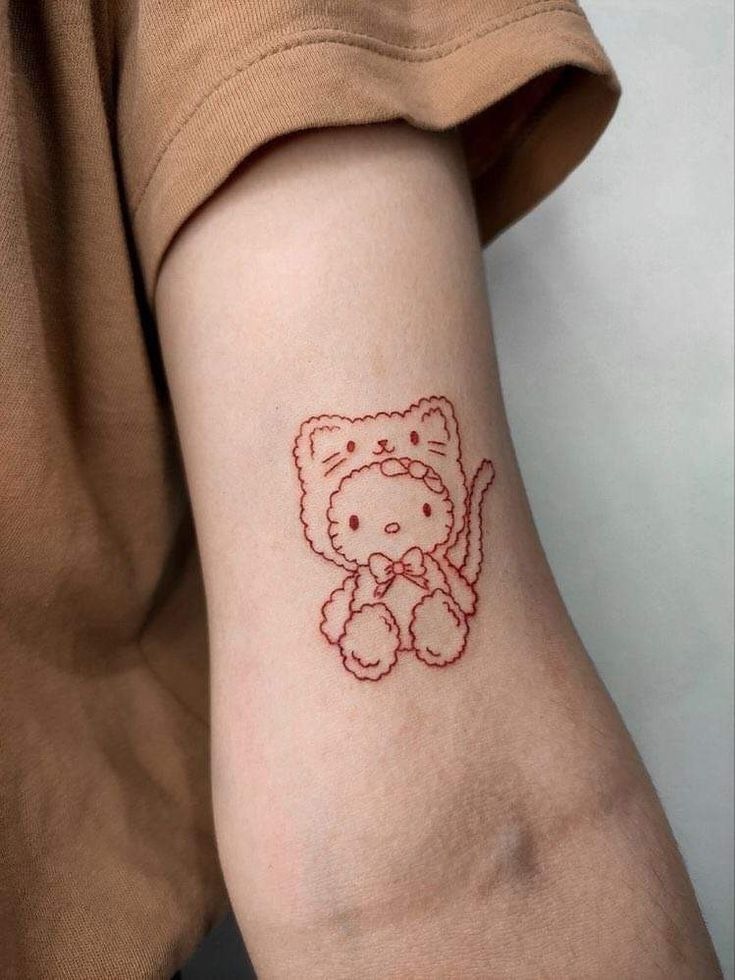 Hello Kitty in a Fluffy Cat Costume Tattoo Tattoo Design