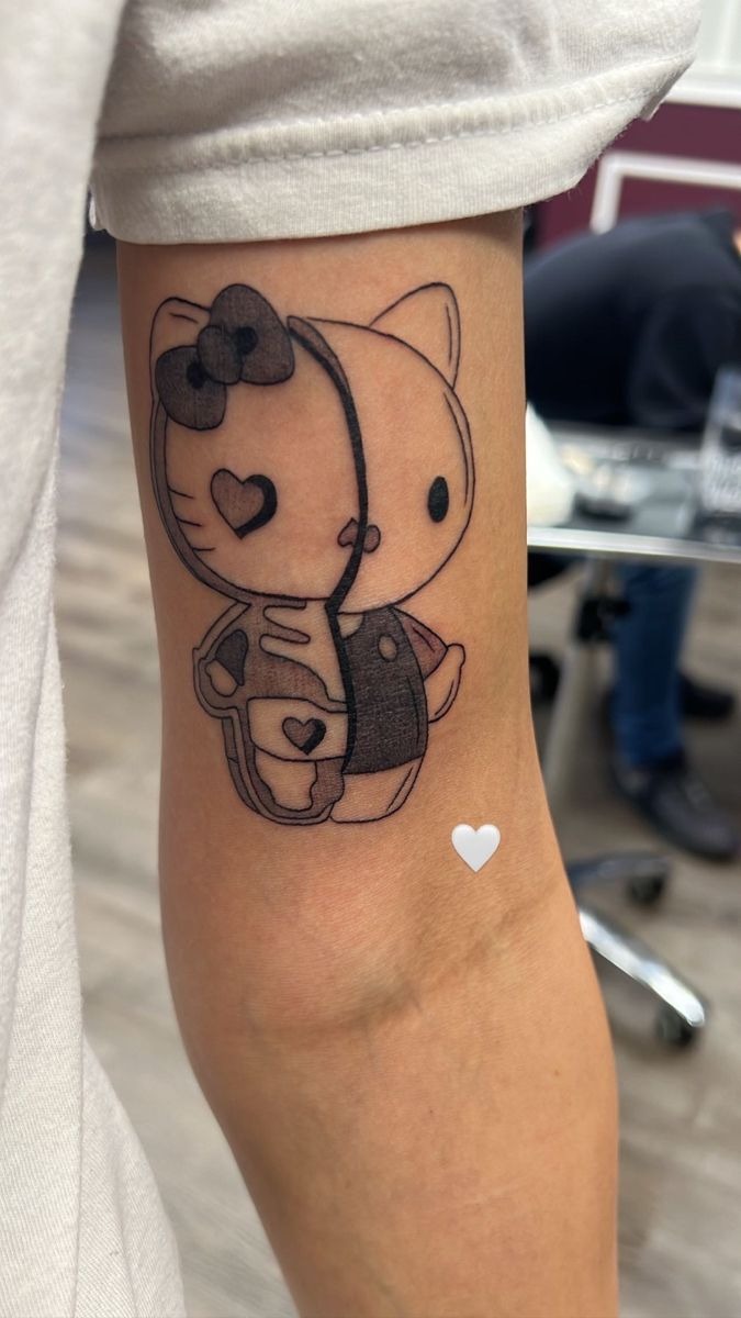 Split-Style Hello Kitty Tattoo Tattoo Design