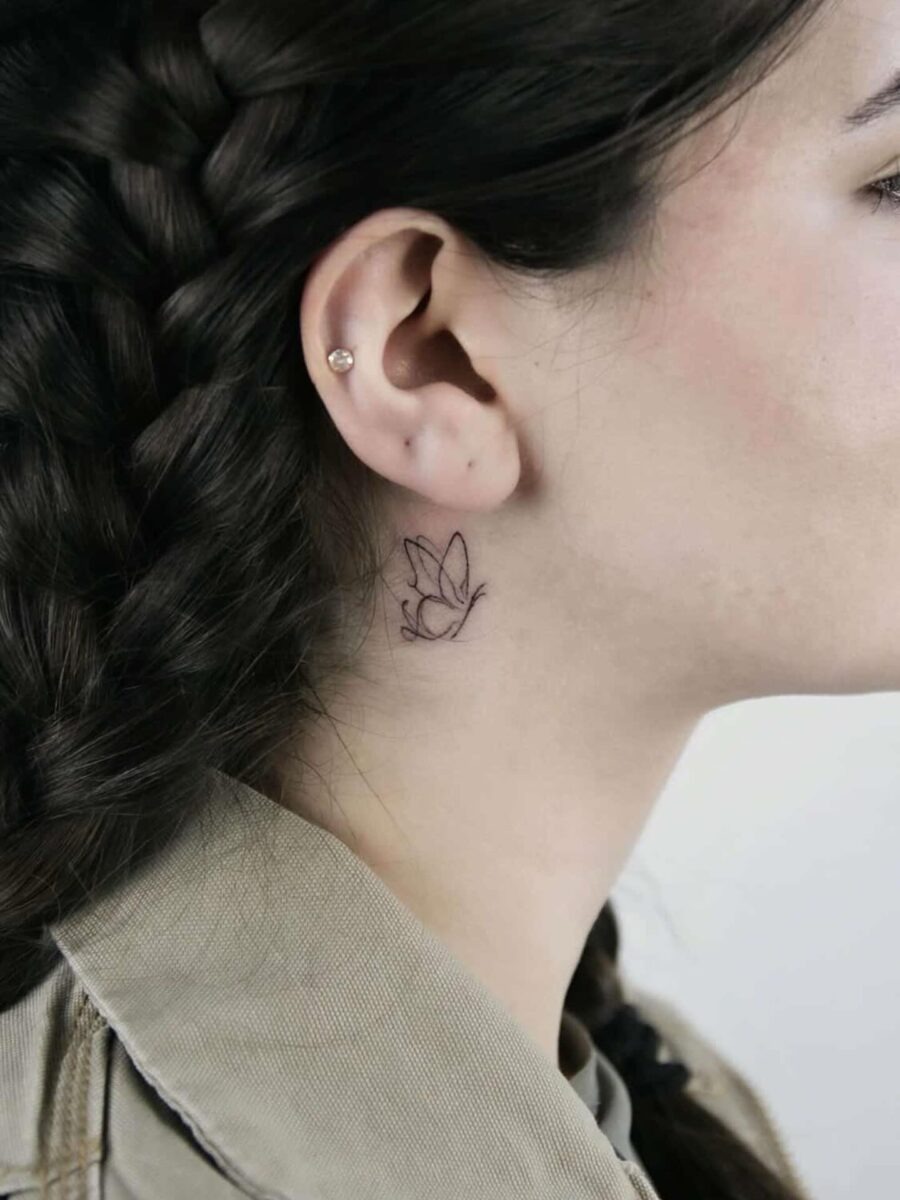 Delicate floral tattoo near the ear Tattoo Design