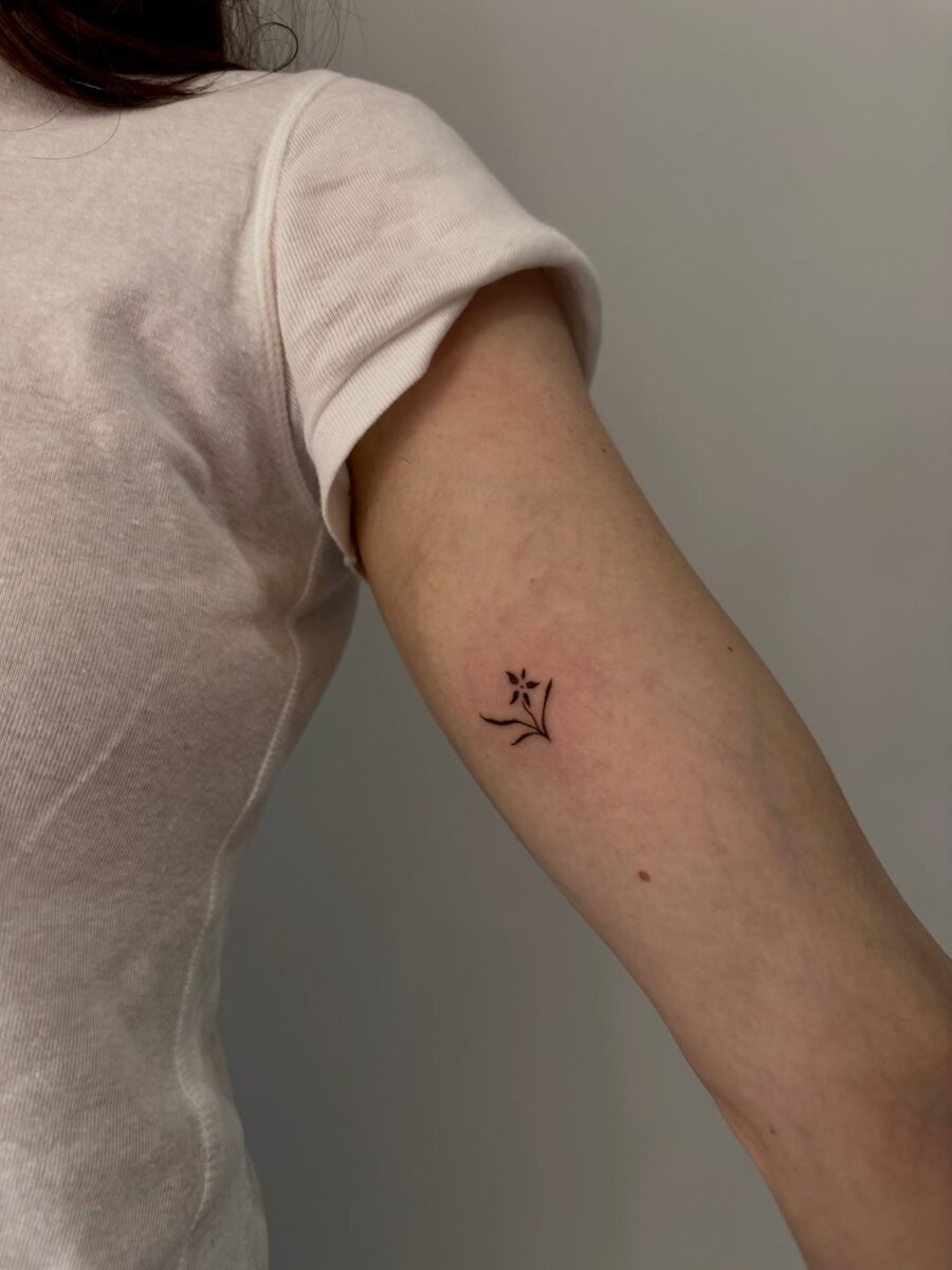 Delicate floral tattoo on the inner arm Tattoo Design