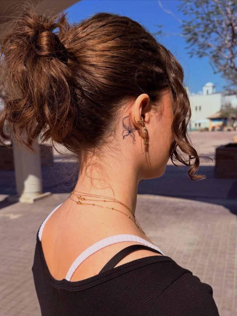 Elegant Hidden Tattoo on the Neck Tattoo Design
