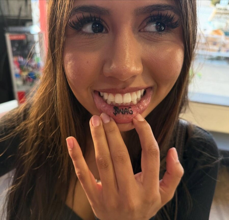 Intriguing hidden lip tattoo revealed casually Tattoo Design