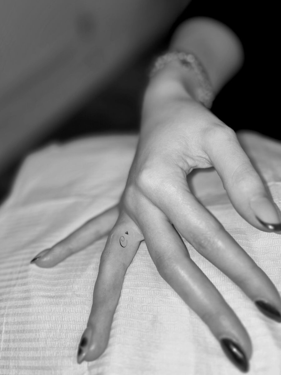Subtle elegance with hidden finger tattoos Tattoo Design