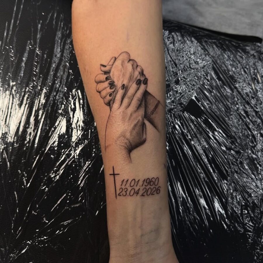 A touching tribute with intertwined hands tattoo Tattoo Design