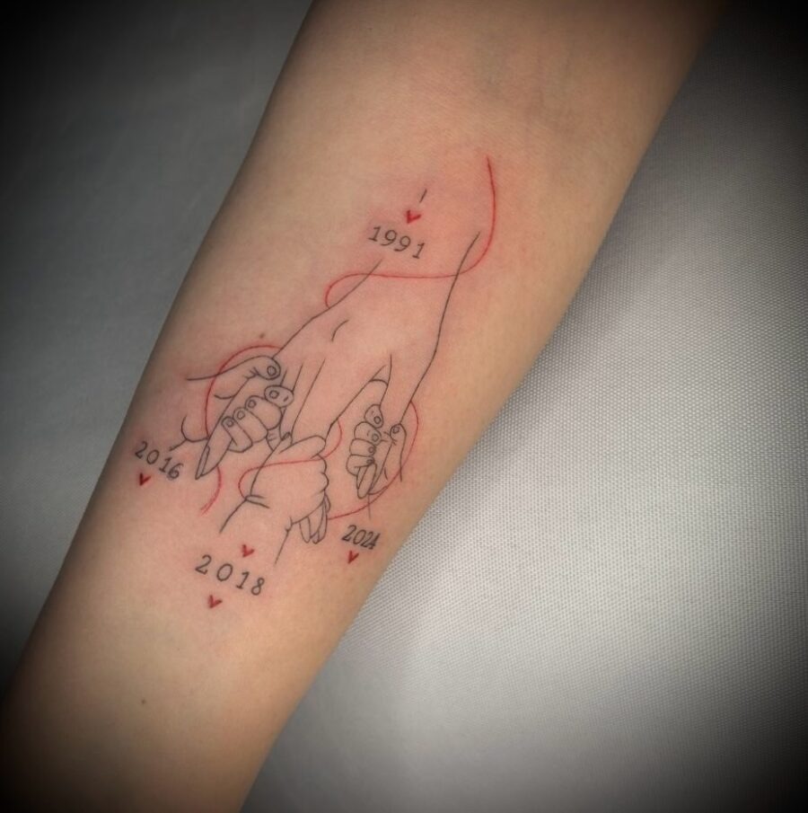 Artistic tribute to love through holding hands Tattoo Design