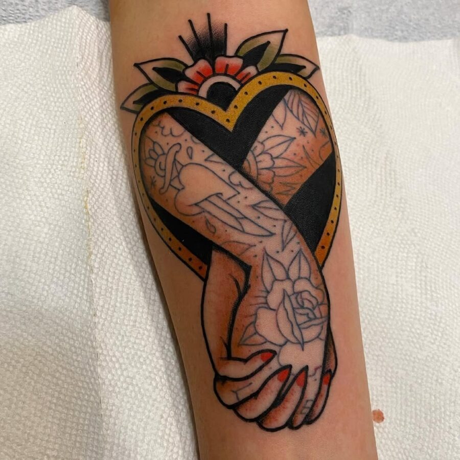 Beautiful heart-shaped holding hands tattoo Tattoo Design