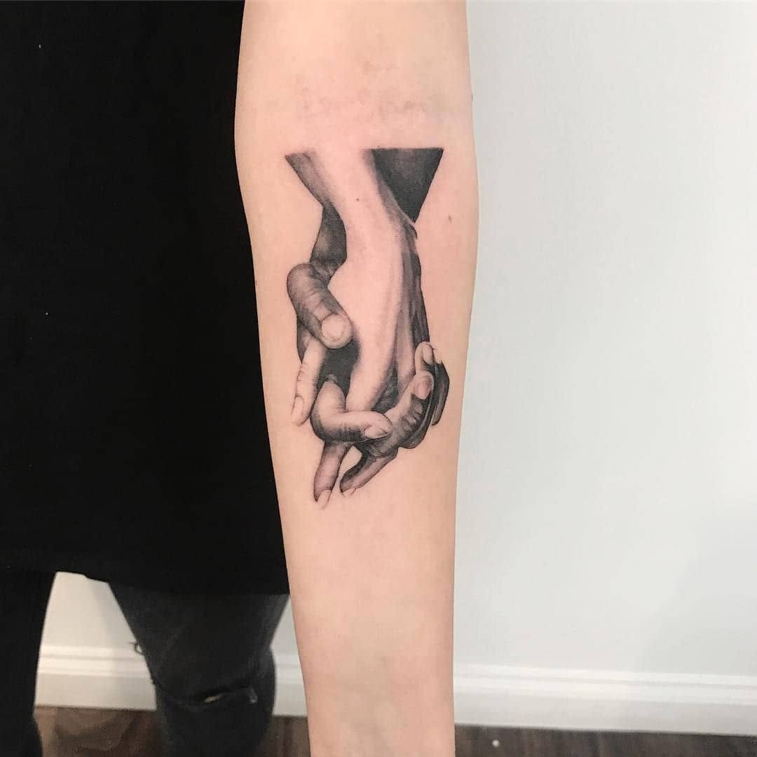 Elegant black and gray holding hands tattoo Tattoo Design