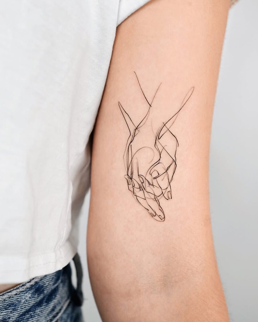 Elegant Minimalist Holding Hands Tattoo Design Tattoo Design
