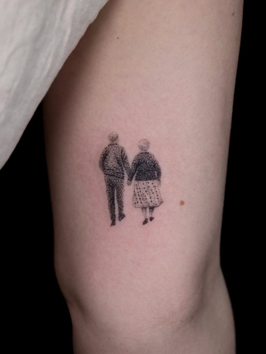 Endearing couple silhouette holding hands tattoo Tattoo Design