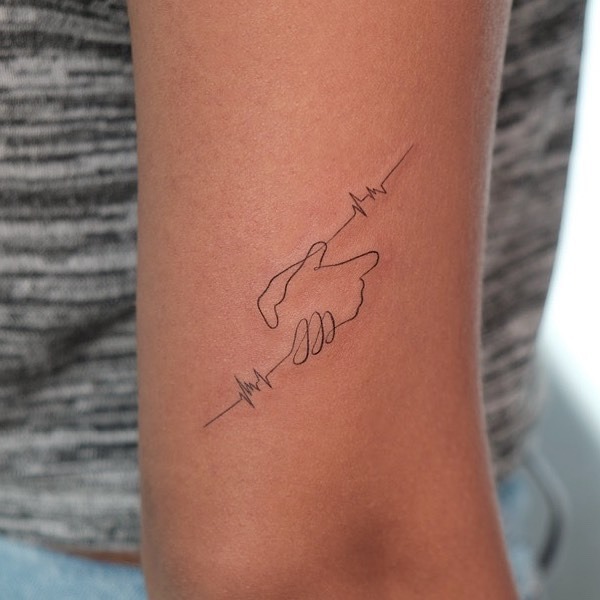 Meaningful heartbeat and hand connection tattoo Tattoo Design