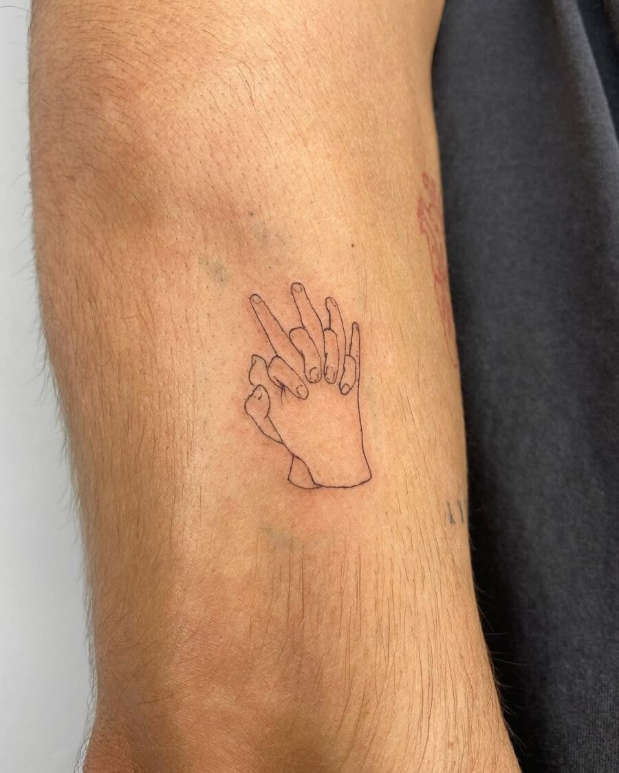 Minimalist Hands Tattoo with Bold Expression Tattoo Design