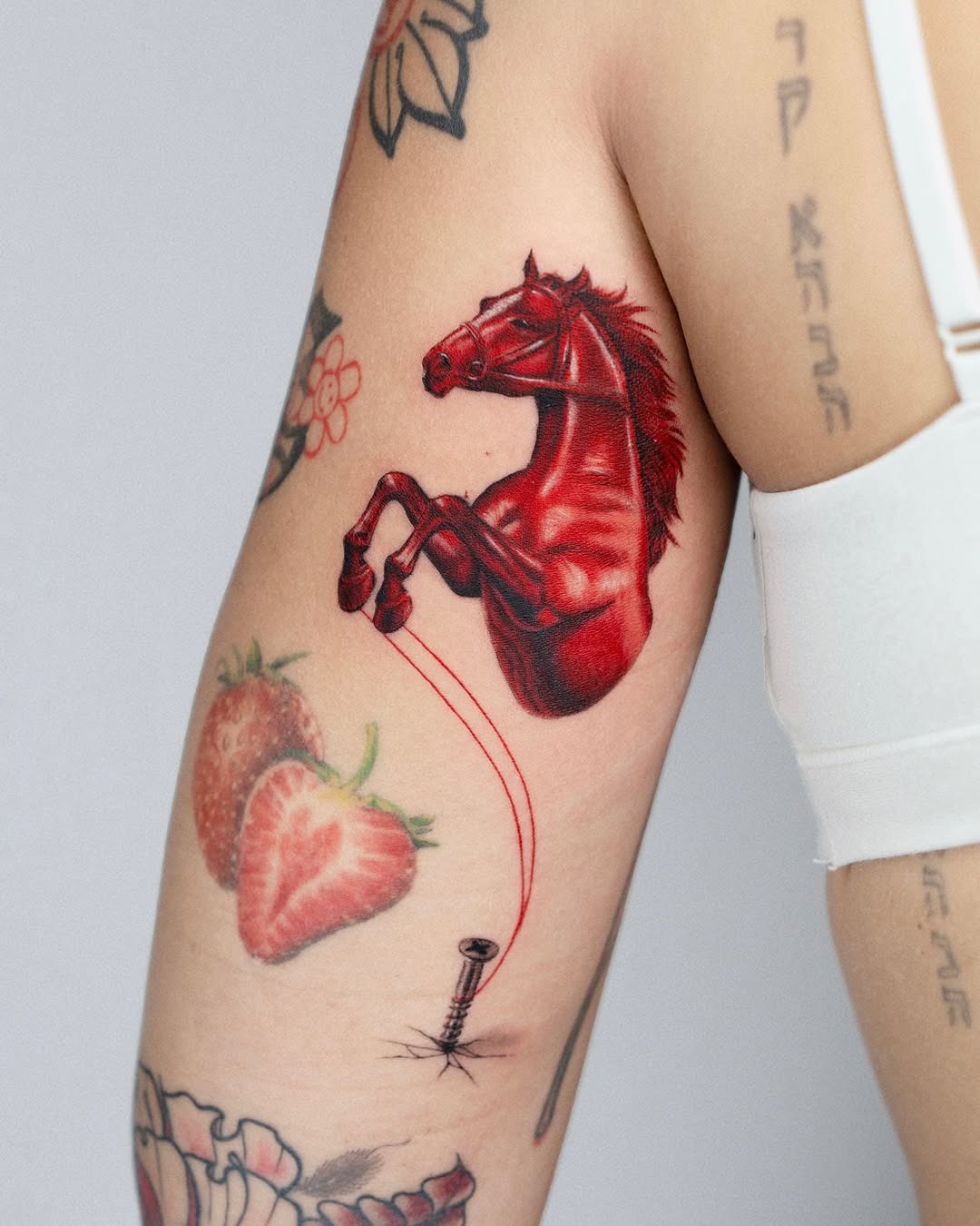 Dynamic red horse tattoo for bold expression Tattoo Design