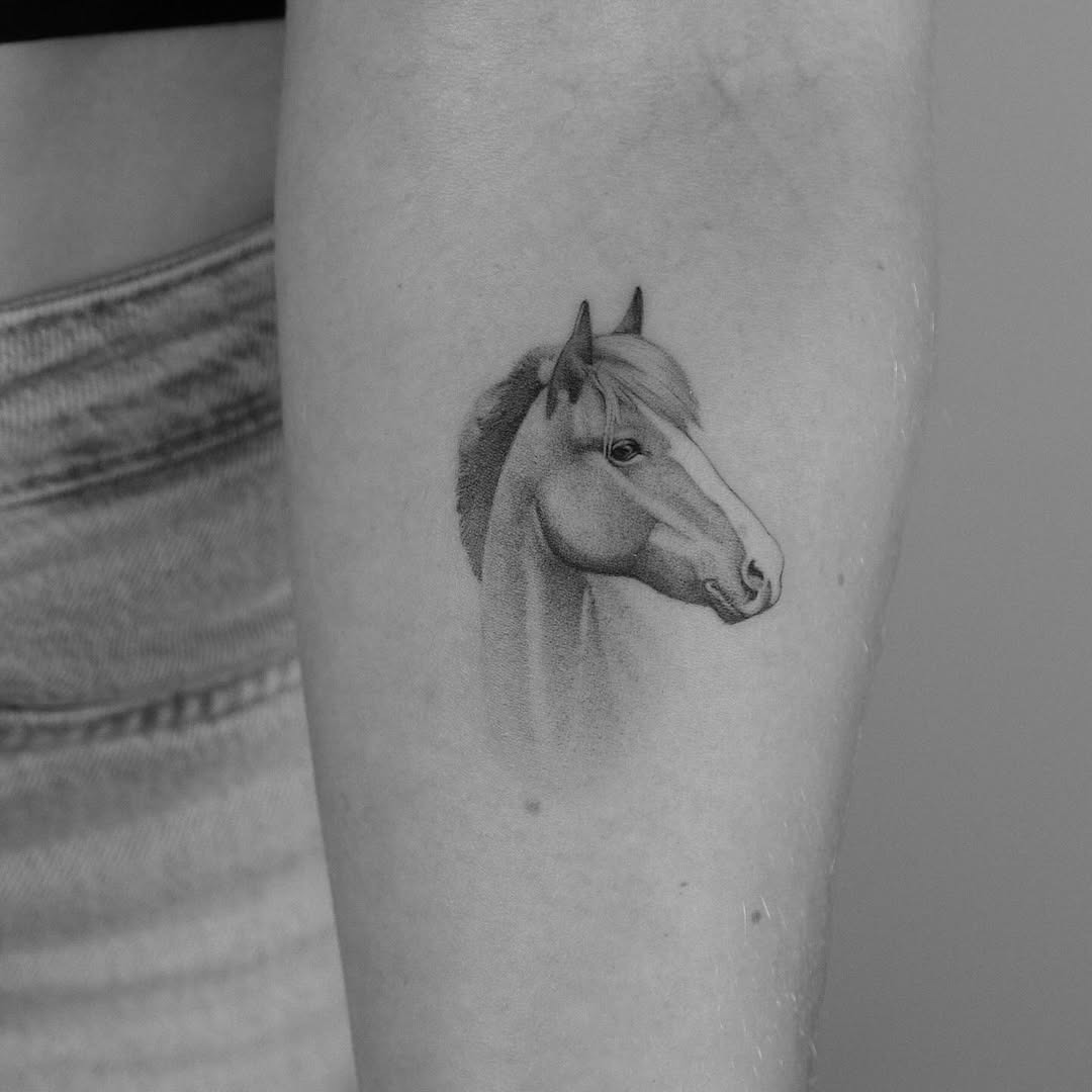 Elegant black and white horse tattoo design Tattoo Design