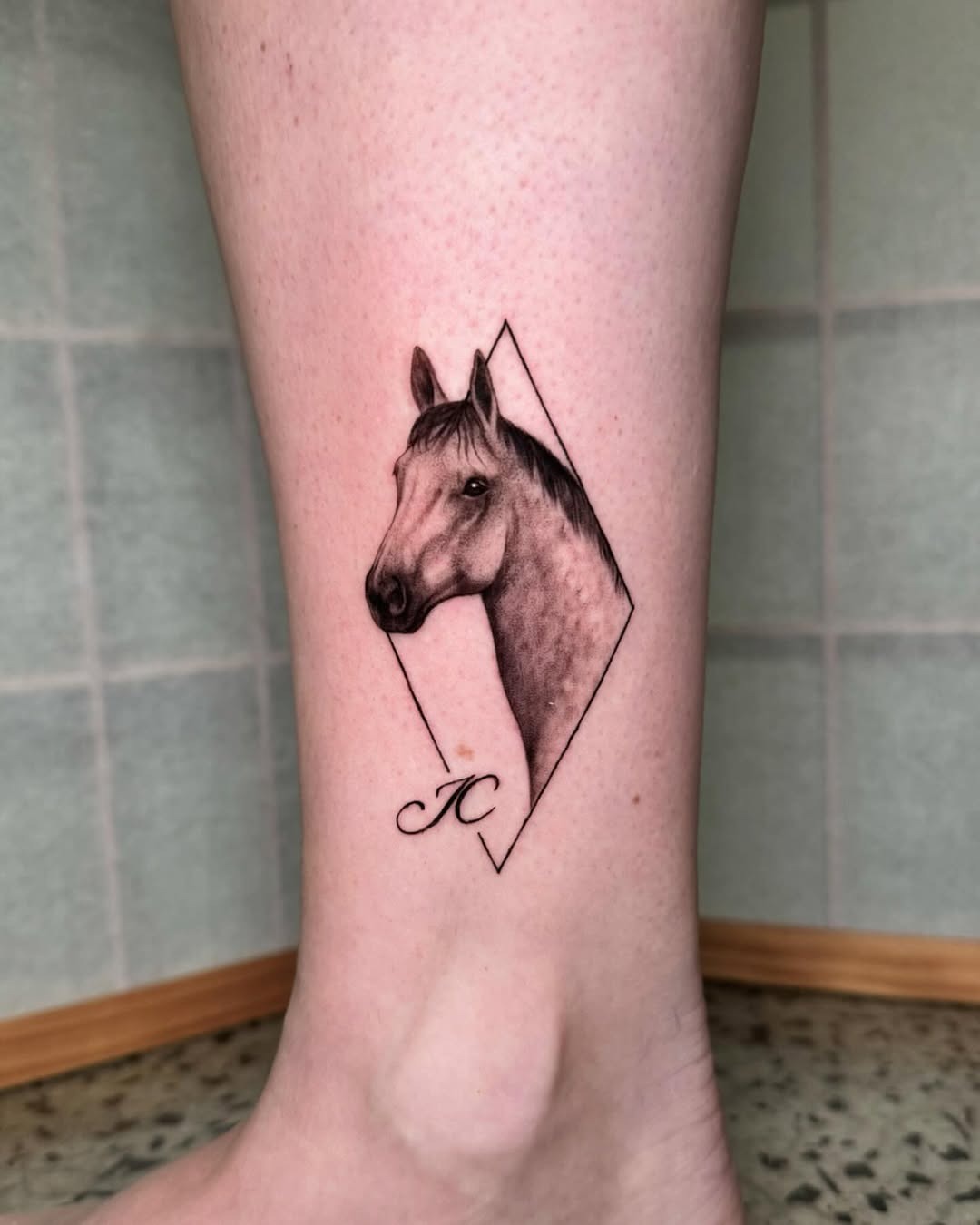 Elegantly crafted horse tattoo with geometric design Tattoo Design
