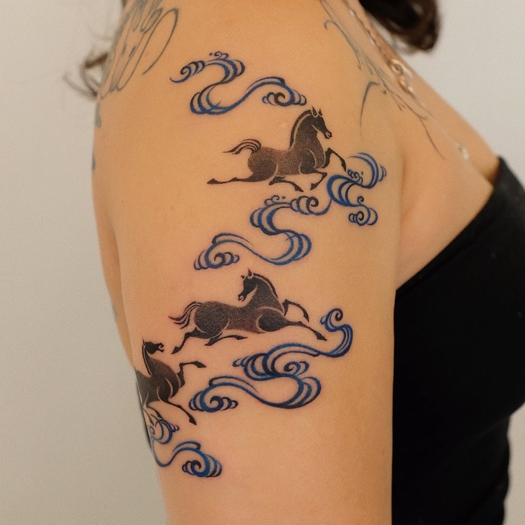 Majestic horses galloping through swirling waves Tattoo Design