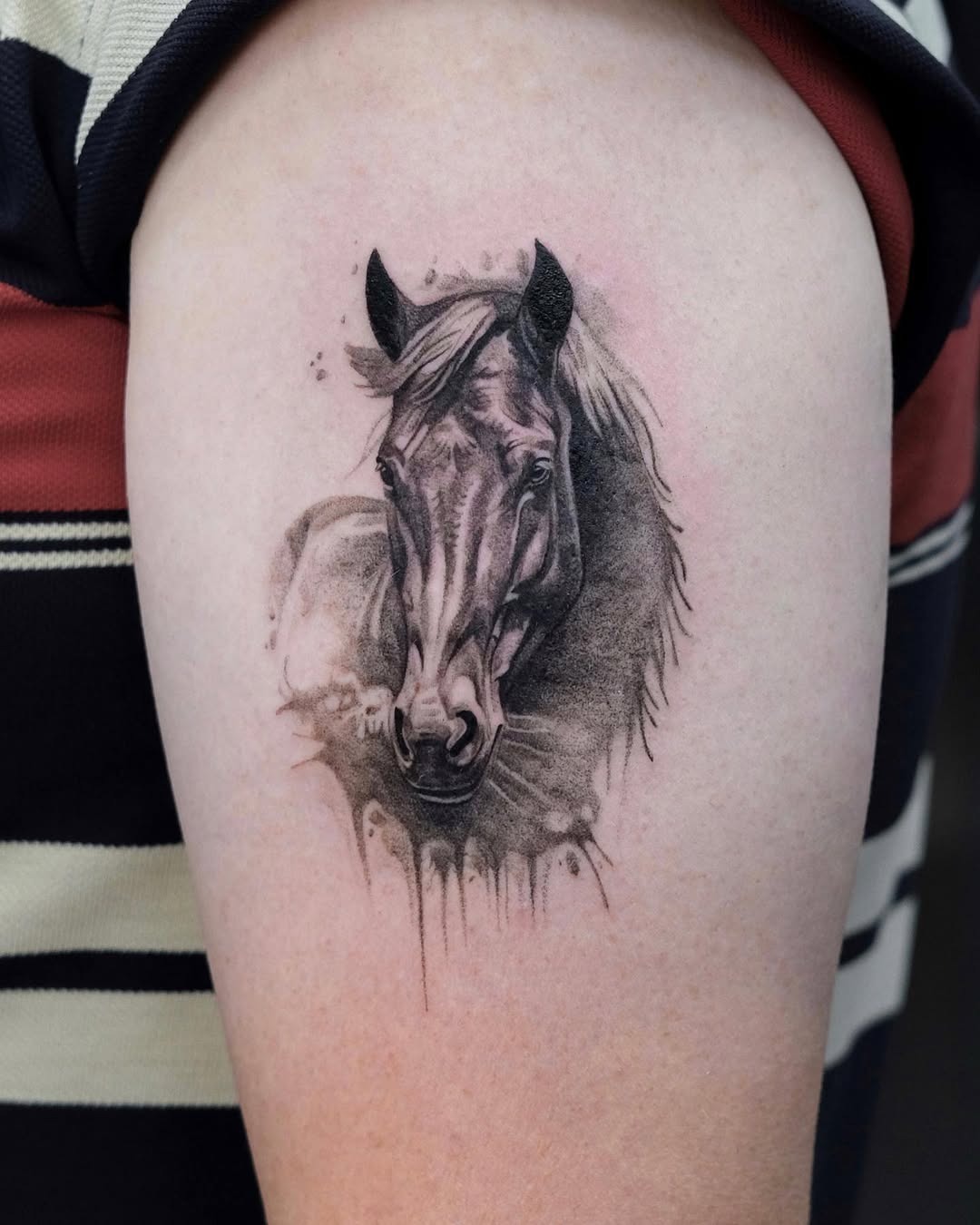 Stunning Black and Gray Horse Artwork on Skin Tattoo Design