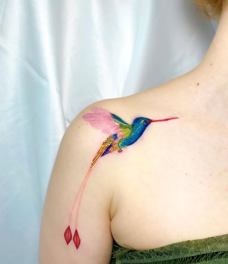 Colorful hummingbird tattoo with graceful details Tattoo Design