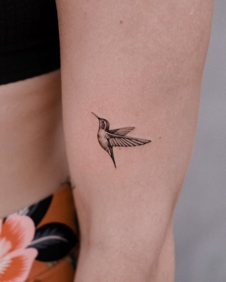 Elegant hummingbird tattoo design on a forearm Tattoo Design