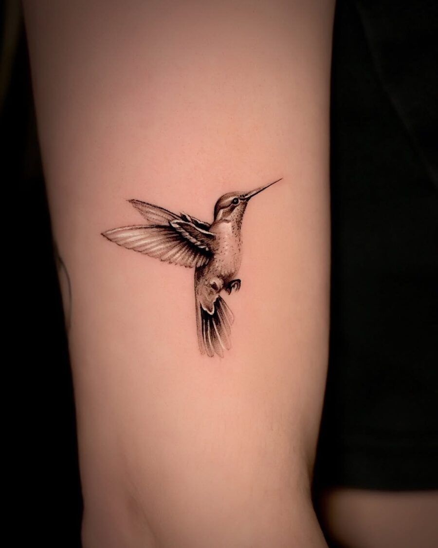 Elegant hummingbird tattoo showcasing intricate details Tattoo Design