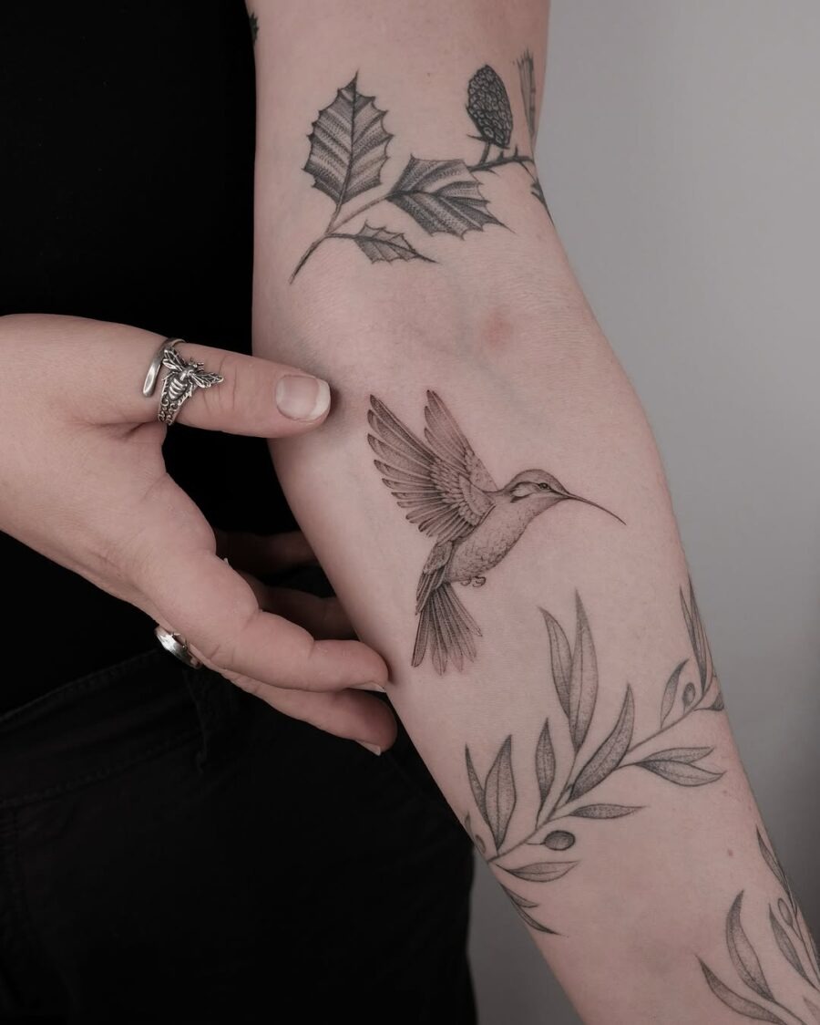 Elegant hummingbird tattoo with intricate detailing Tattoo Design
