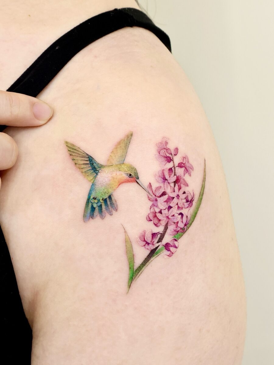 Vibrant Hummingbird and Orchid Tattoo Art Tattoo Design
