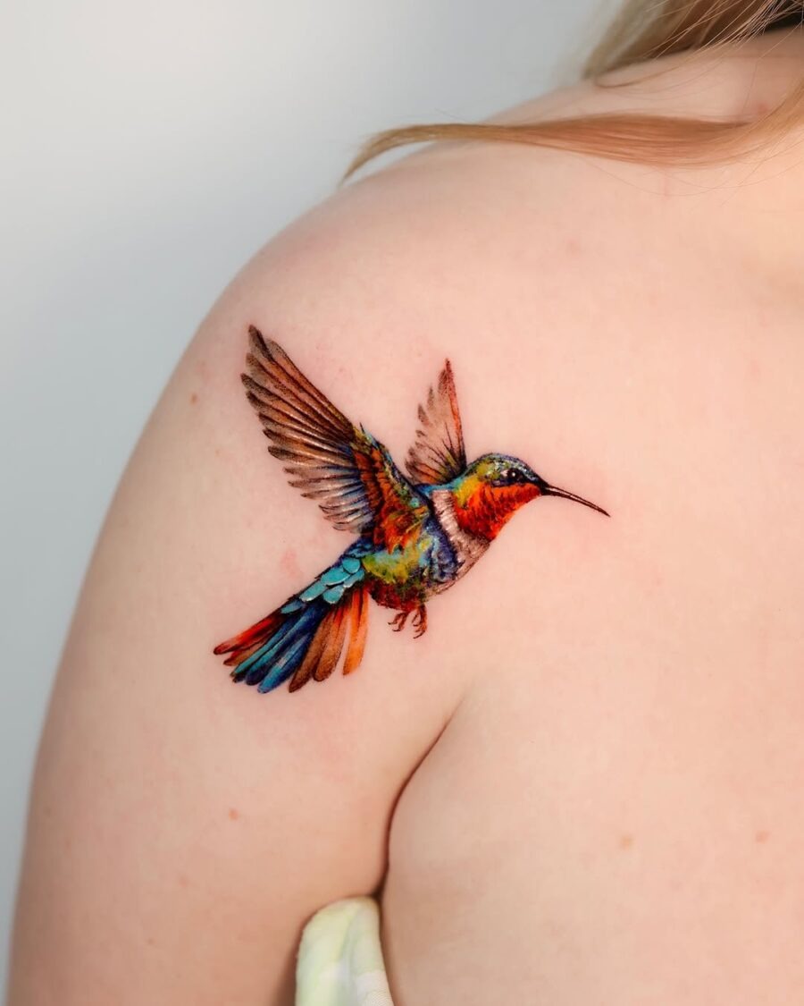 Vibrant hummingbird tattoo showcasing dynamic artistry Tattoo Design