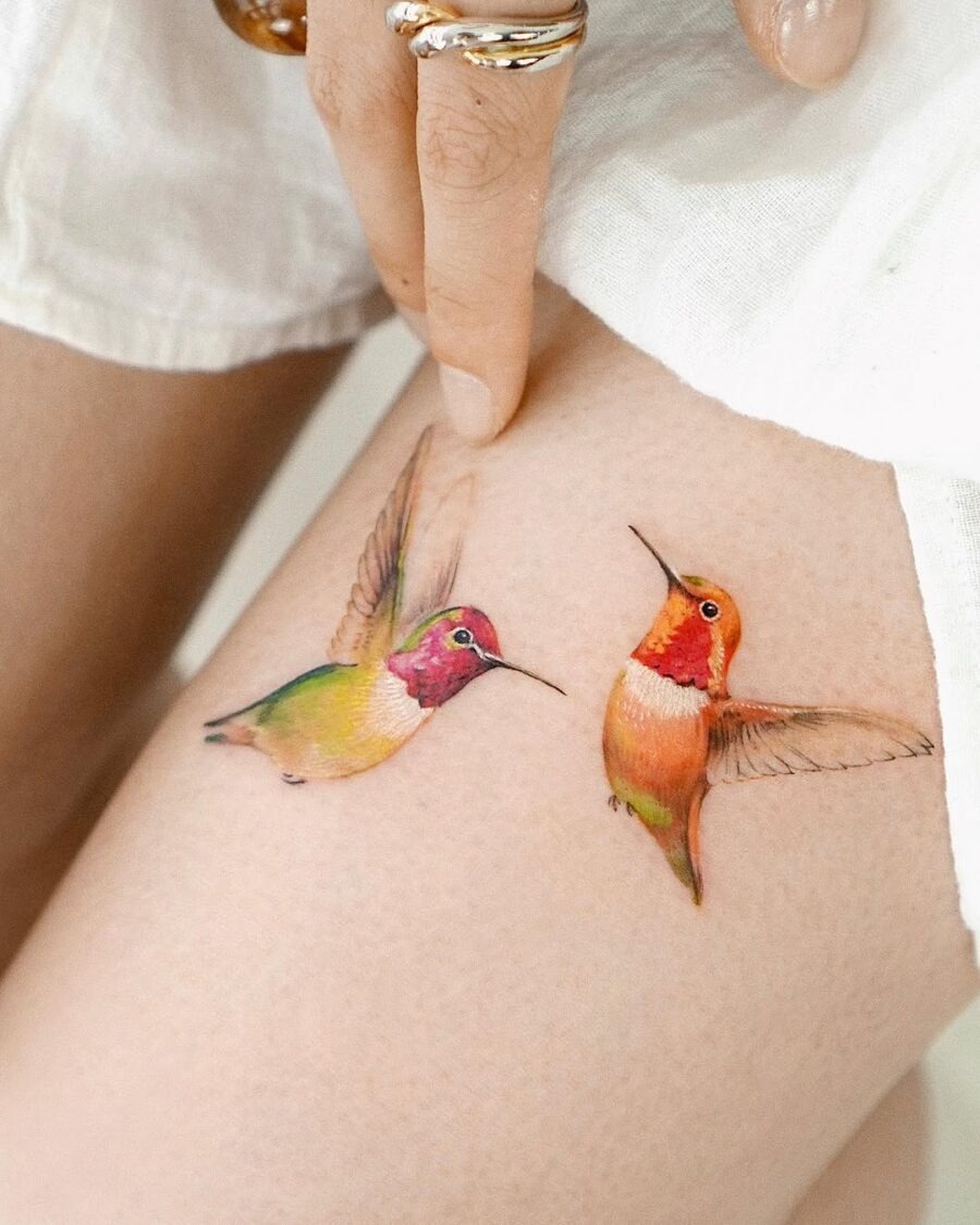Vibrant hummingbird tattoos with striking colors Tattoo Design