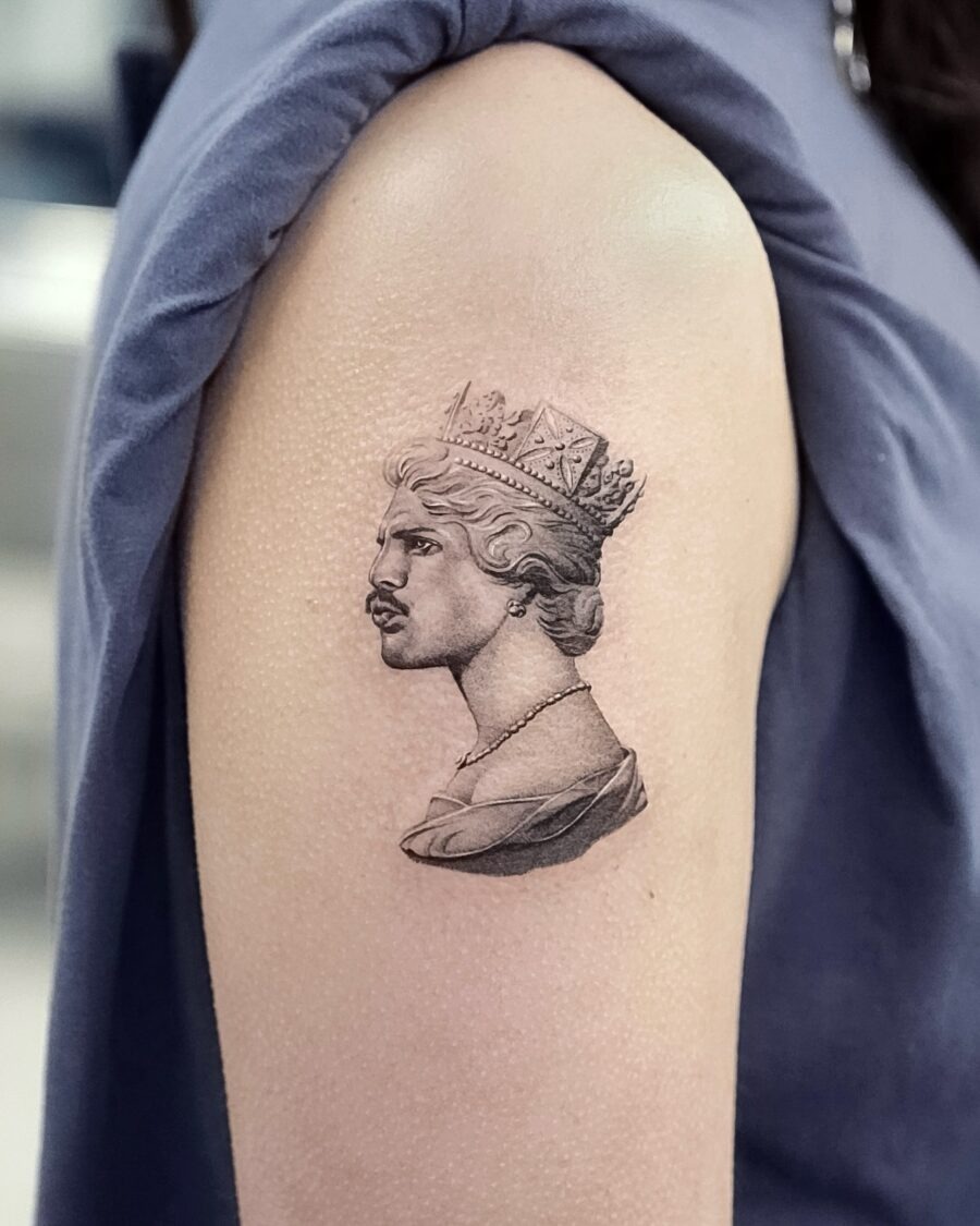 Elegant queen tattoo showcasing stunning realism Tattoo Design