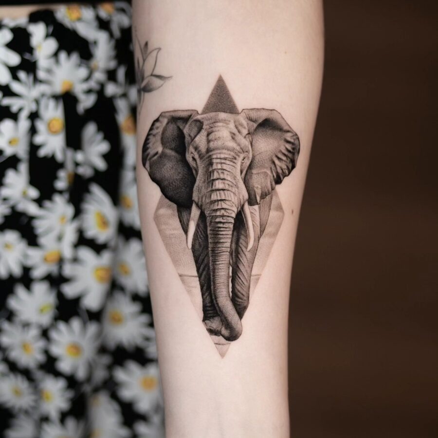 Stunning Elephant Tattoo with Geometric Elements Tattoo Design