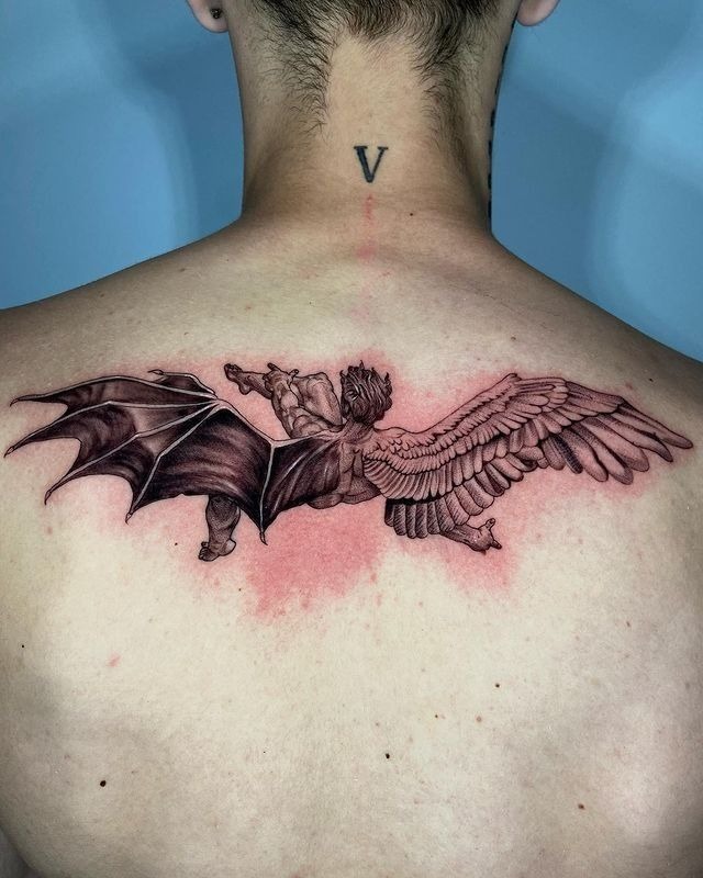 Back Icarus With Feather and Bat Wing Tattoo Design