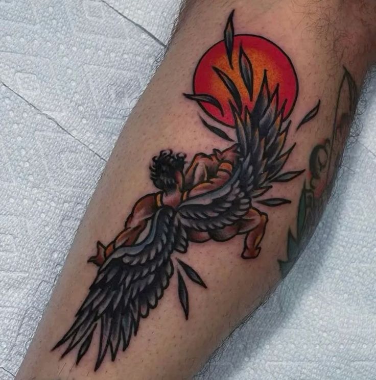 Bold Icarus With Red Sun Tattoo Design