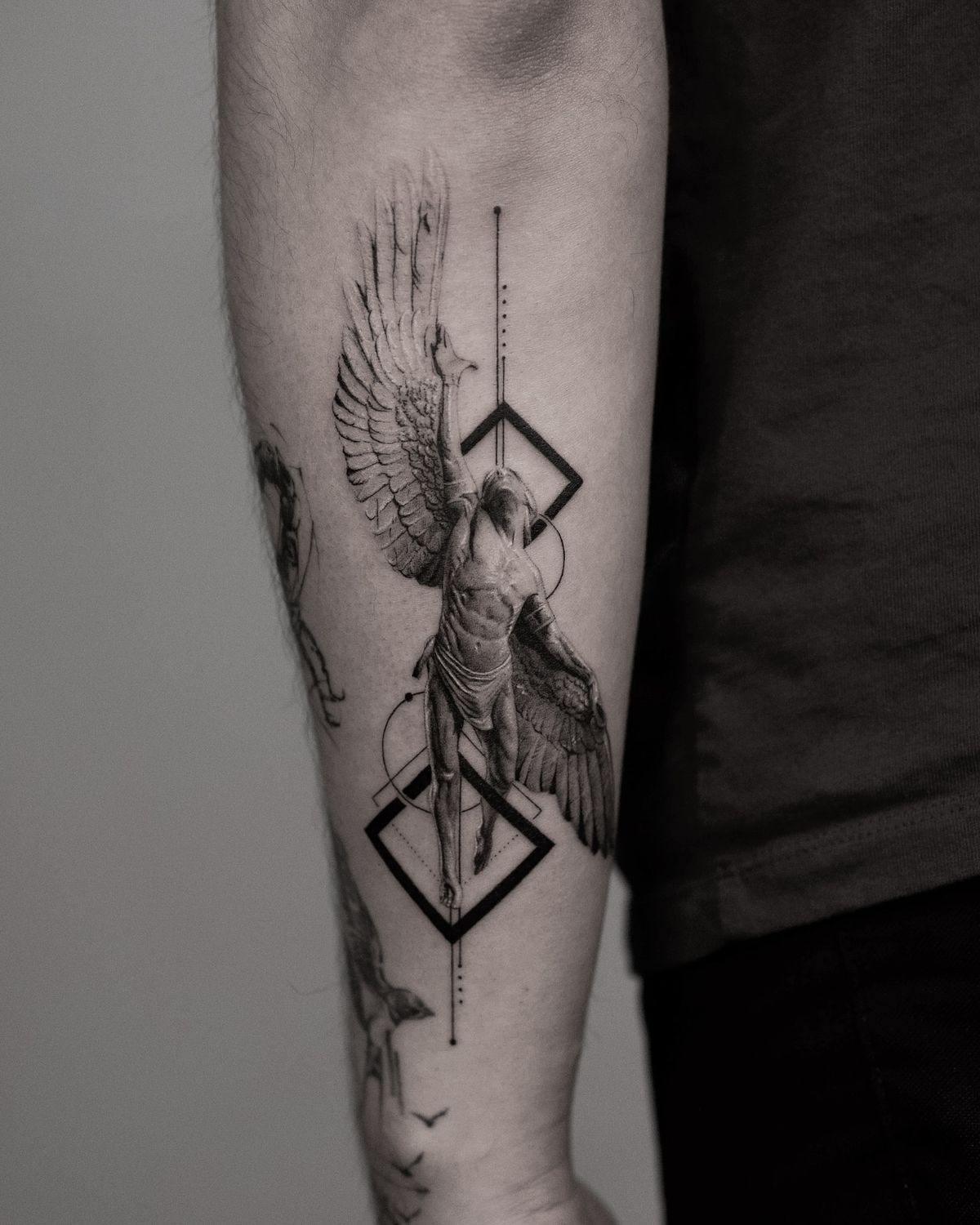 Geometric Icarus Forearm Tattoo Tattoo Design