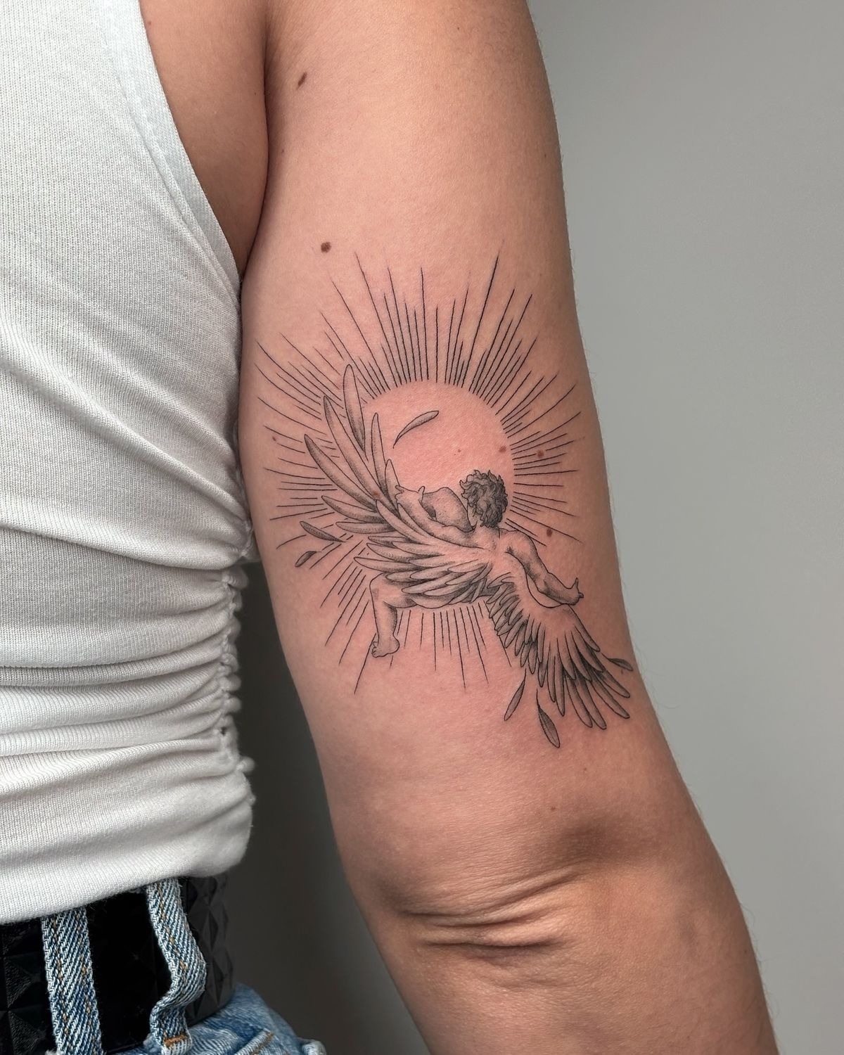 Radiant Sun Icarus Upper Arm Tattoo Tattoo Design
