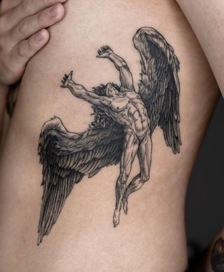 Rib Icarus With Dramatic Wings Tattoo Design