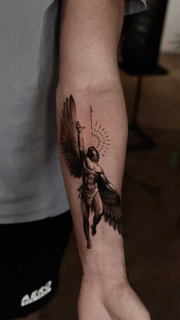 Standing Icarus With Raised Arm Tattoo Design