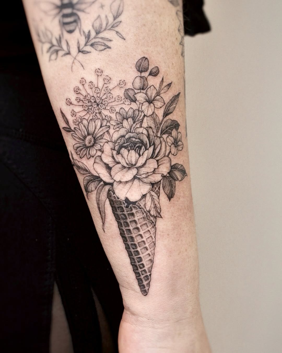 Blooming flowers in an ice cream cone tattoo Tattoo Design
