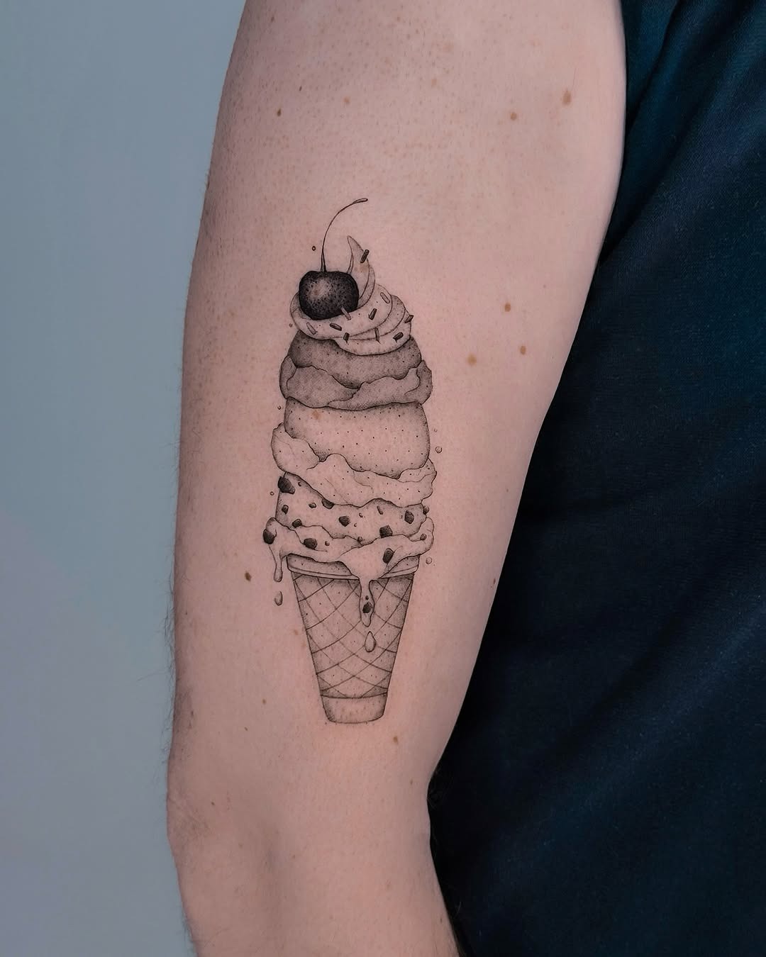 Charming ice cream cone tattoo with cherry Tattoo Design