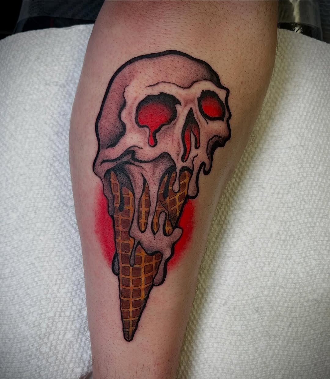 Chilling skull ice cream cone tattoo design Tattoo Design